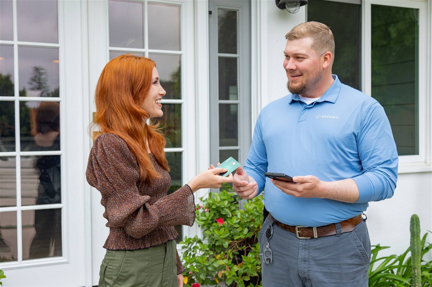 Brooks technician with a satisfied Moses Lake-area customer at the front door